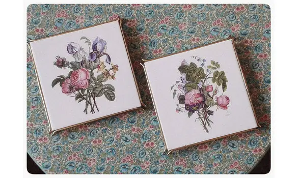 Paire de dessous de plats faïence