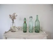 Trio de bouteilles anciennes