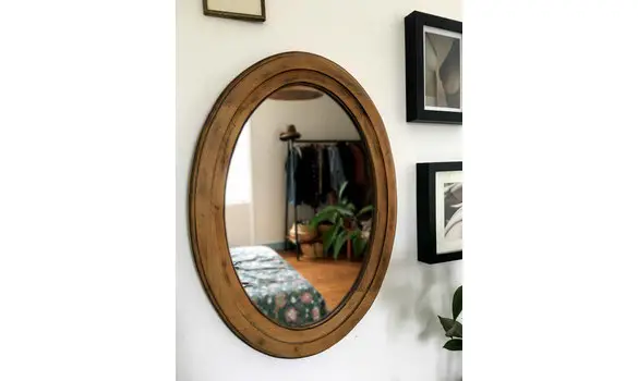 Miroir ovale en bois